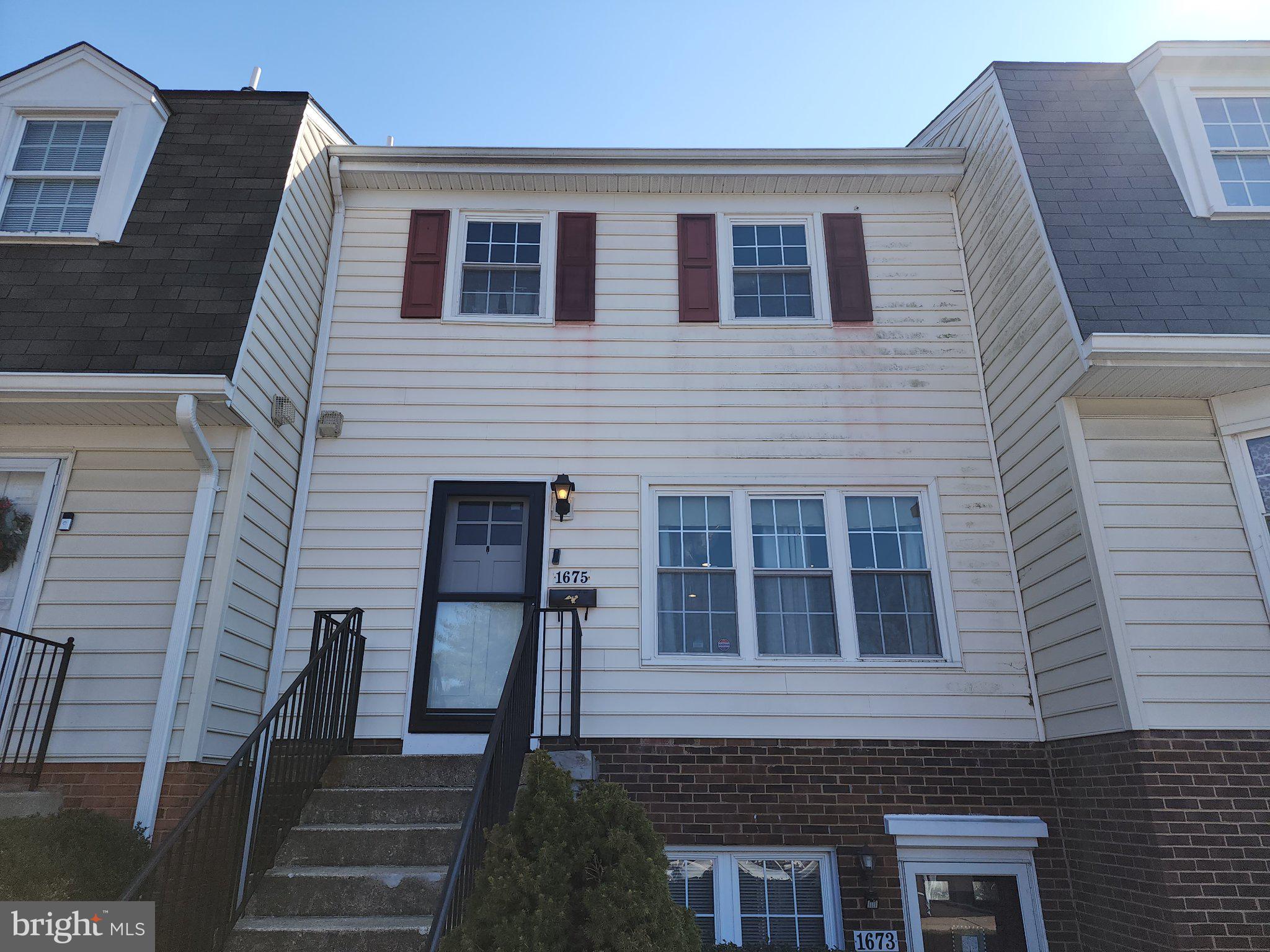 1675 Ridgely Court, Unit 182 Crofton, MD 21114 - Photo 6 of 47 a front view of a house with stairs
