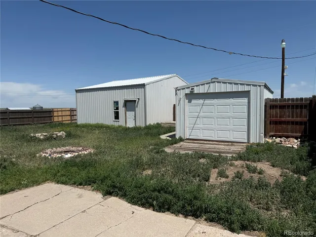 a view of a backyard of the house