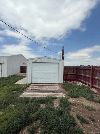 a view of a room with wooden walls
