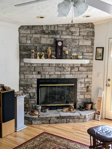 a fireplace with a table in front of it