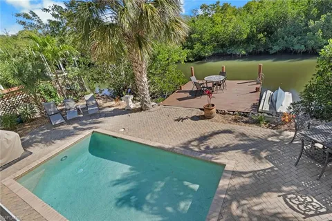 a view of a backyard with a patio