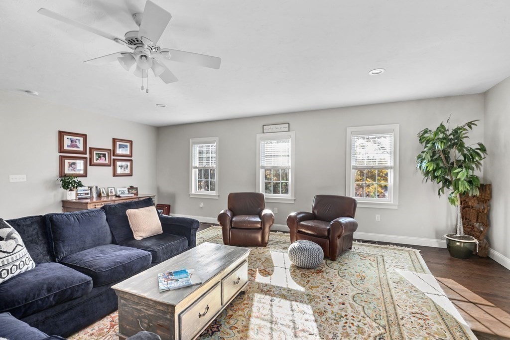 455 Broadway Hanover, MA 02339 - Photo 7 of 26 a living room with furniture and a potted plant