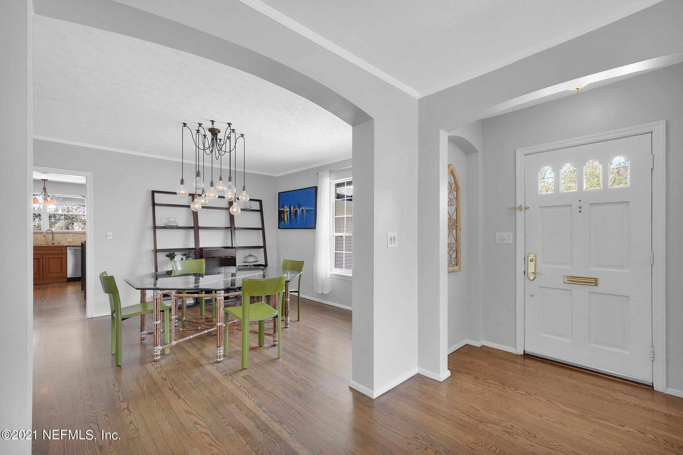 1614 Dunsford Road Jacksonville, FL 32207 - Photo 5 of 24 a view of a dining room with furniture and wooden floor