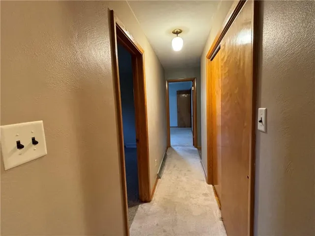 an empty room with gym equipment