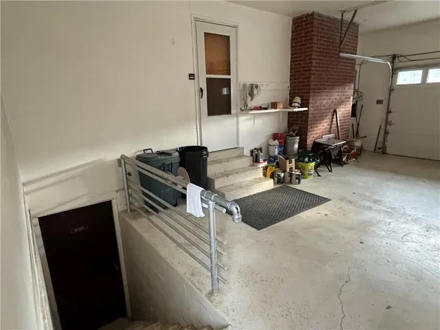 a kitchen with stainless steel appliances granite countertop a refrigerator sink and cabinets