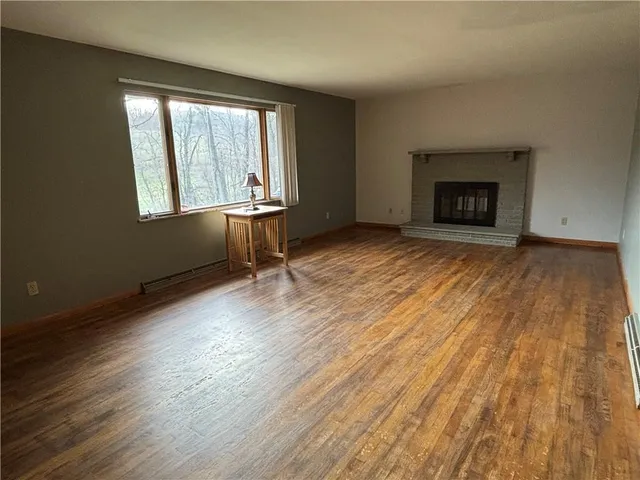 a kitchen with stainless steel appliances granite countertop a sink and a cabinets