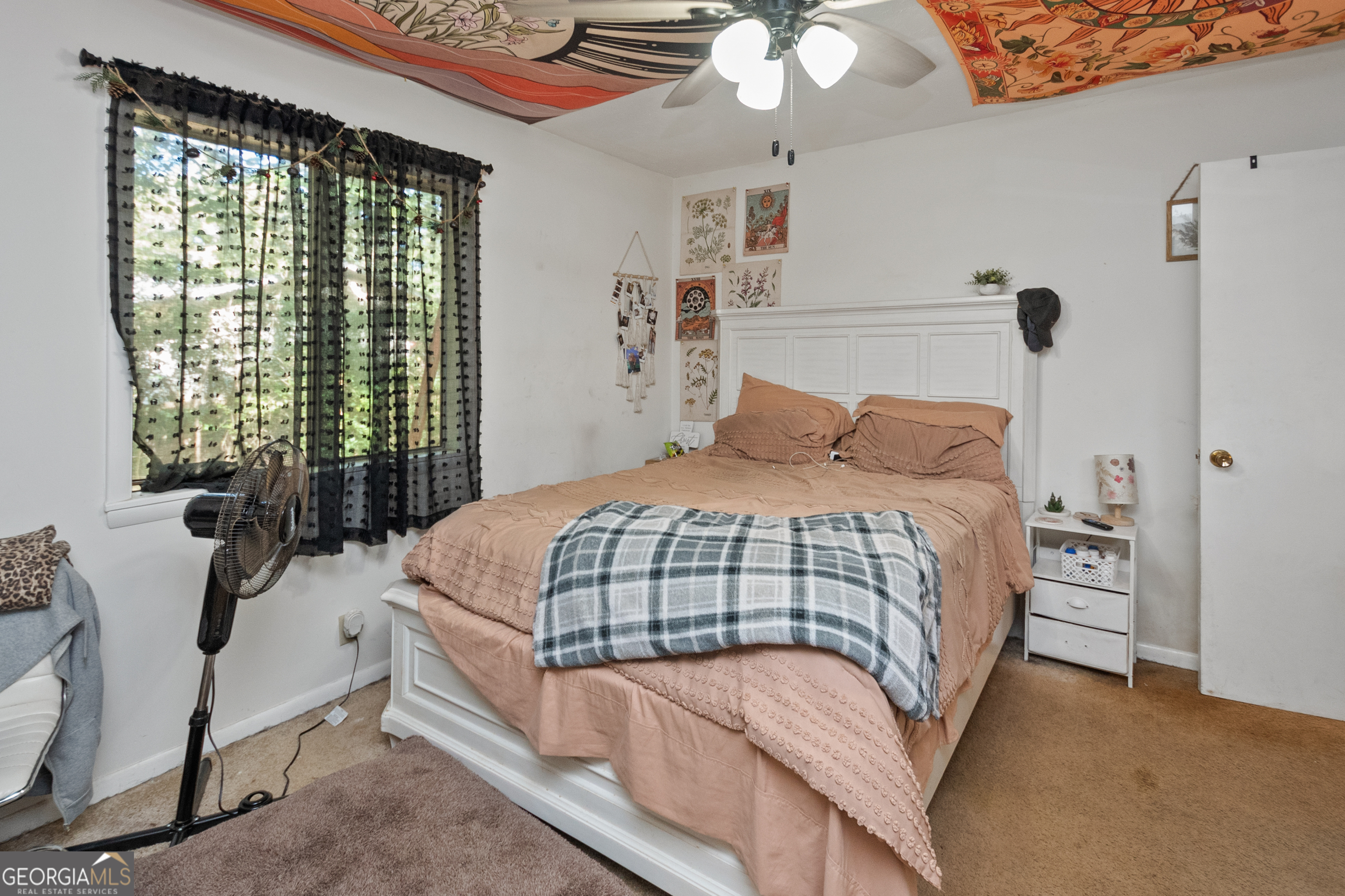 808 South Fling Road LaGrange, GA 30240 - Photo 19 of 35 a bedroom with a bed and a window