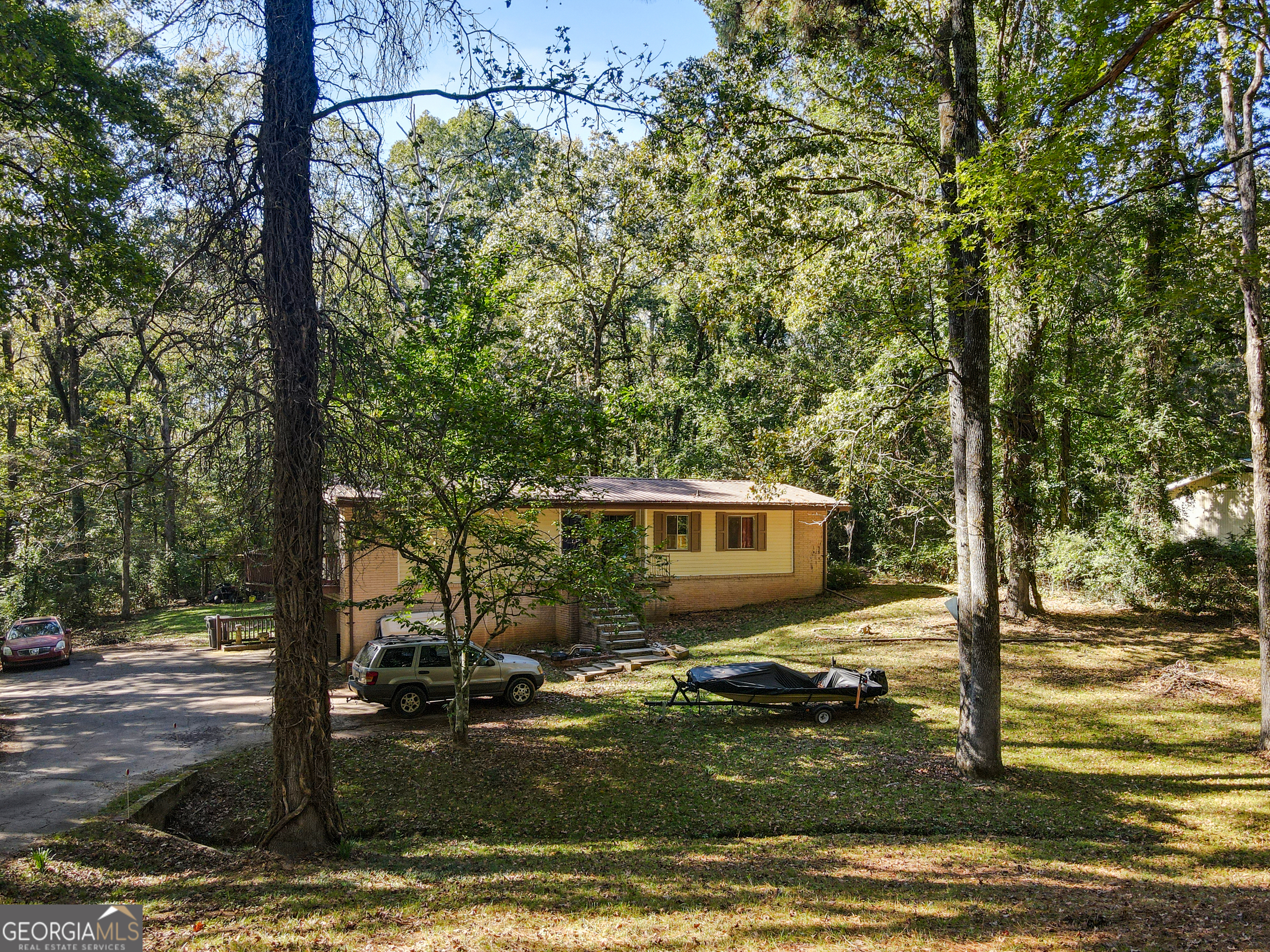 808 South Fling Road LaGrange, GA 30240 - Photo 2 of 35 a view of a house with backyard porch and sitting area
