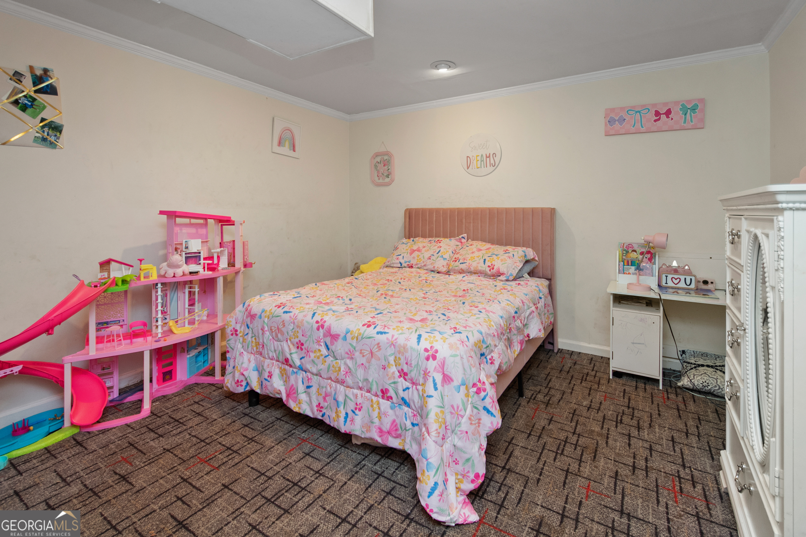 808 South Fling Road LaGrange, GA 30240 - Photo 22 of 35 a bedroom with a bed and a chandelier