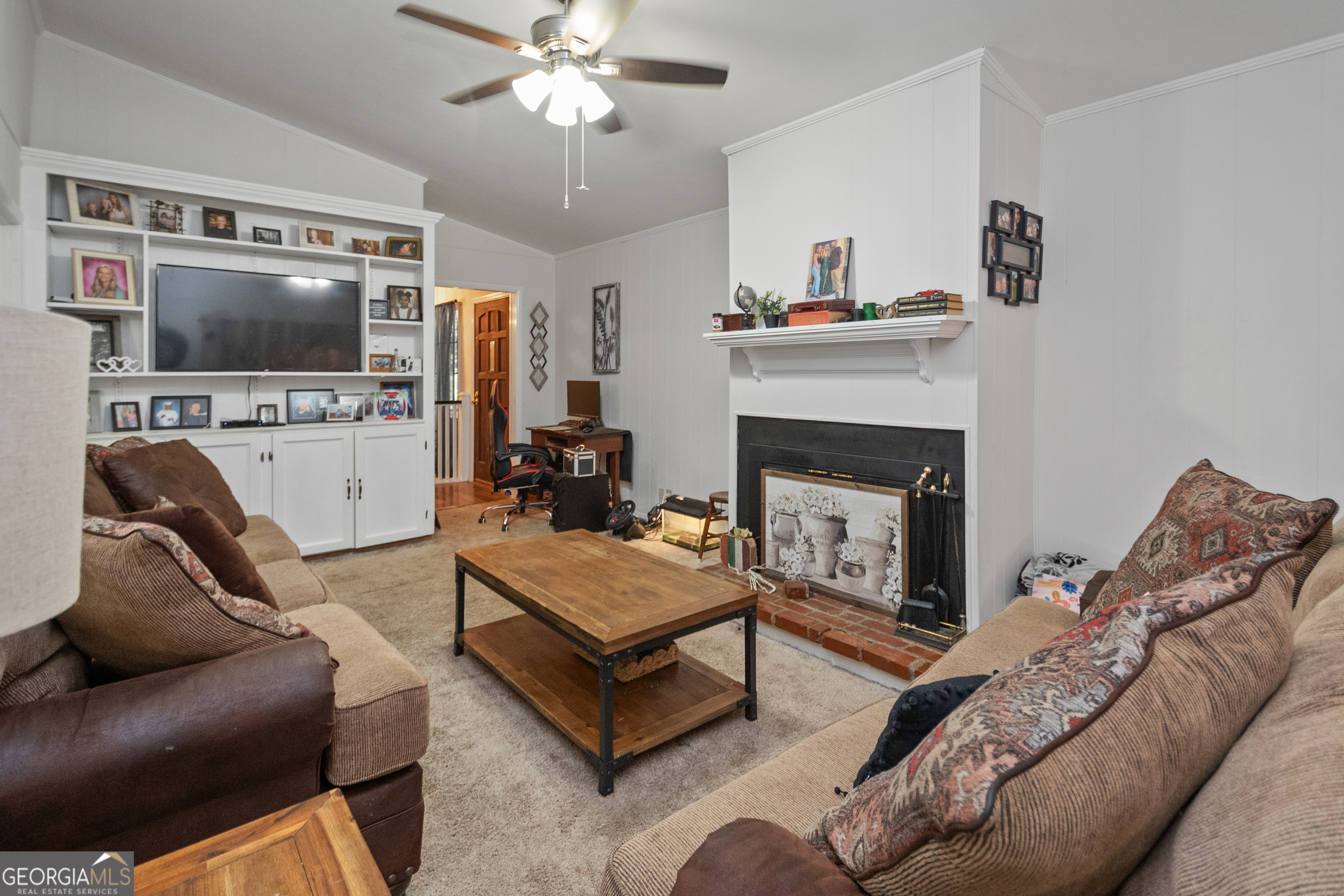 808 South Fling Road LaGrange, GA 30240 - Photo 5 of 35 a living room with furniture and a fireplace