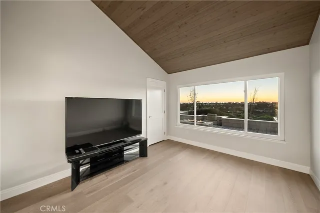 a view of a terrace with couches and sky view