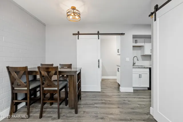 a view of a dining room with furniture
