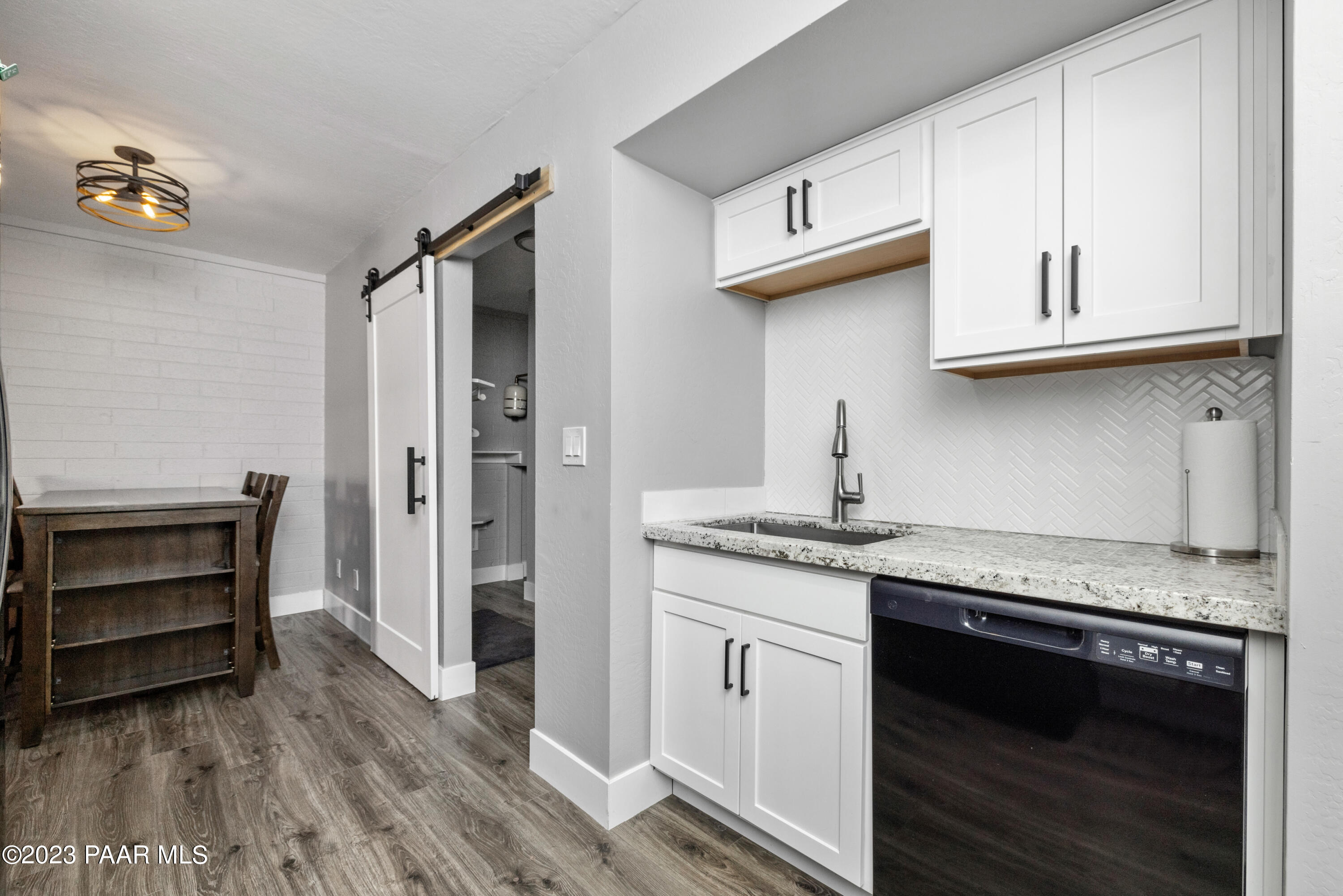 8339 Florentine Road, Unit 2 Prescott Valley, AZ 86314 - Photo 10 of 21 KITCHEN-DINING-LAUNDRY