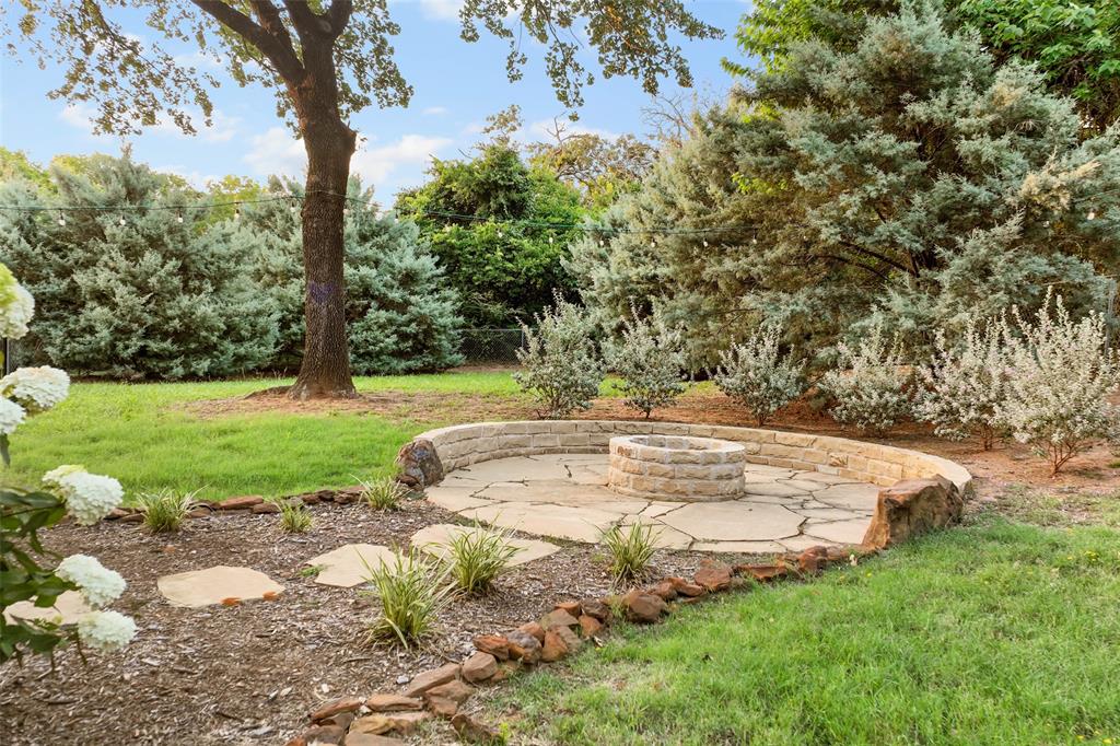 124 Garza Road Shady Shores, TX 76208 - Photo 34 of 40 Stone firepit