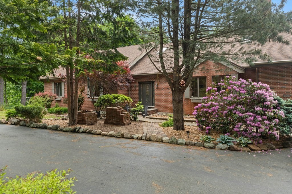 157 Spofford Road Boxford, MA 01921 - Photo 1 of 42 front view of a house with a small yard