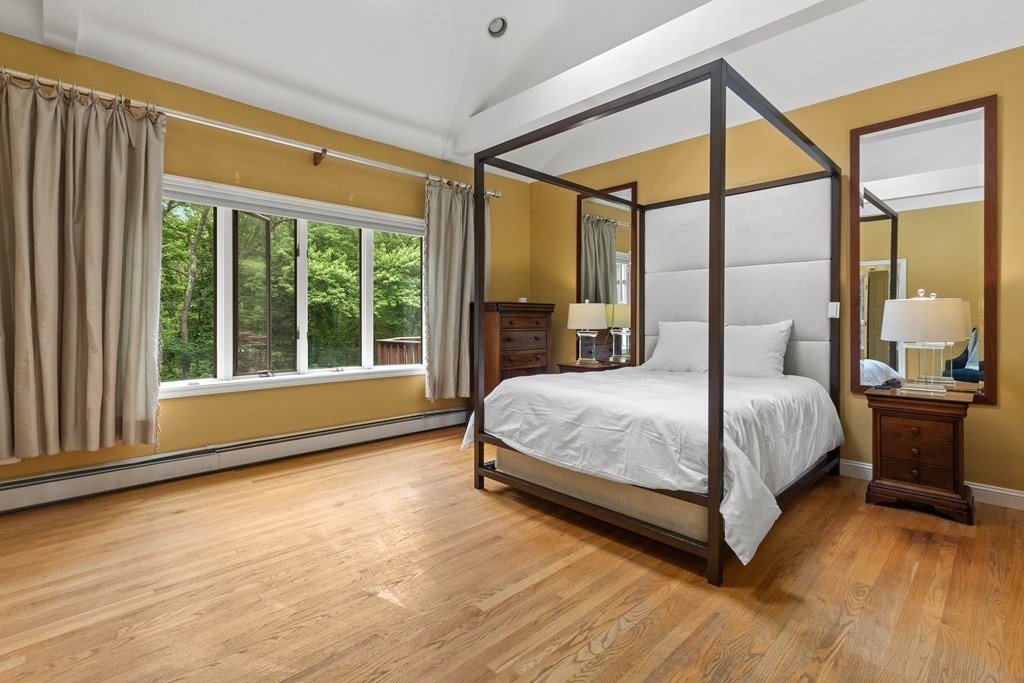 157 Spofford Road Boxford, MA 01921 - Photo 17 of 42 a bedroom with a large bed and a large window