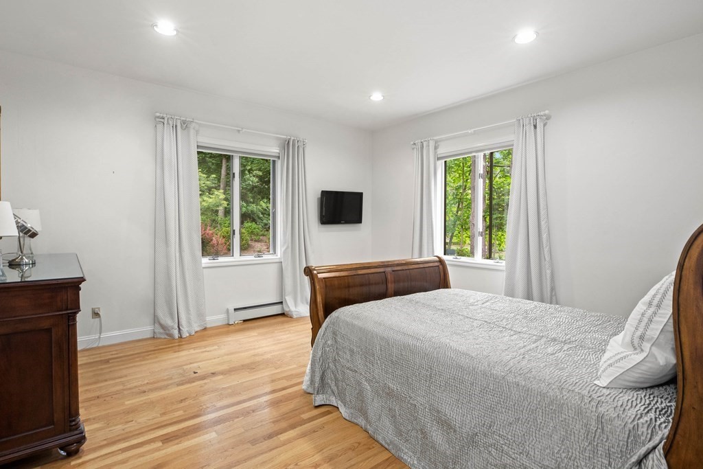 157 Spofford Road Boxford, MA 01921 - Photo 23 of 42 a bedroom with a bed and a window
