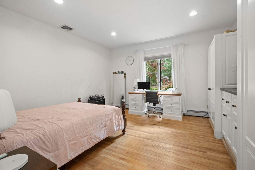 157 Spofford Road Boxford, MA 01921 - Photo 24 of 42 a bedroom with a bed and window