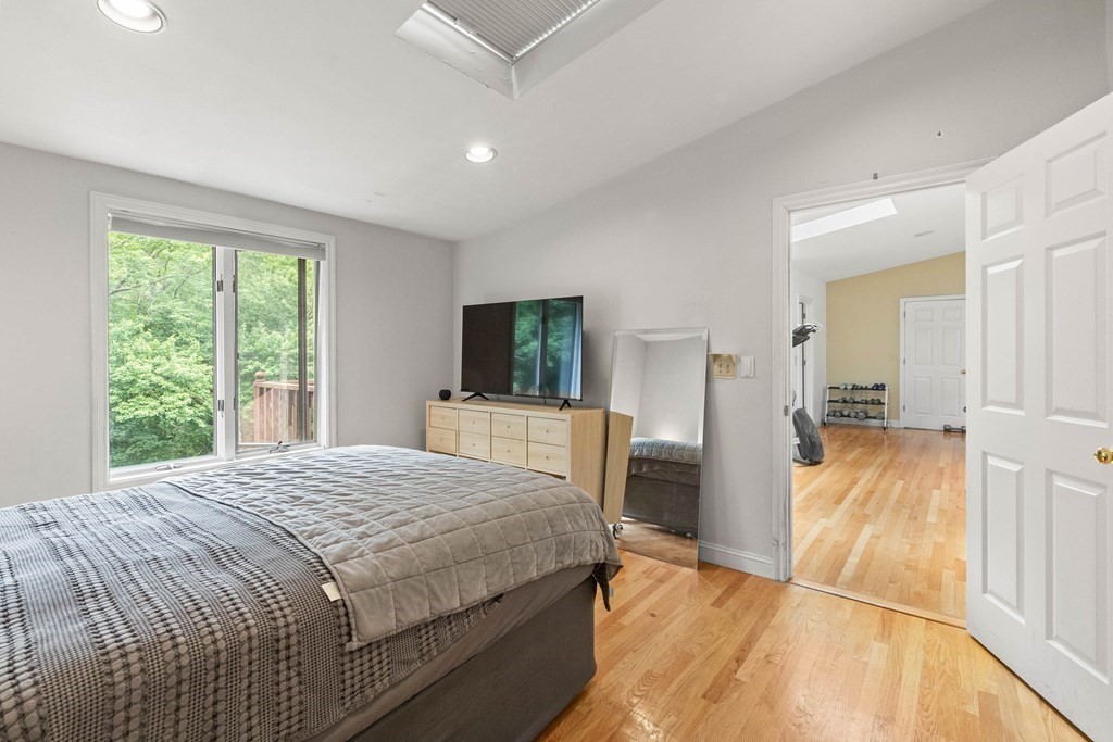 157 Spofford Road Boxford, MA 01921 - Photo 27 of 42 a bedroom with a bed and a view of kitchen