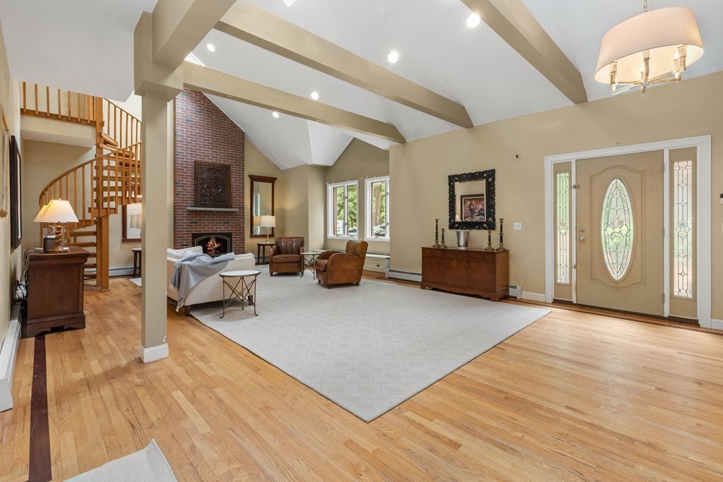 157 Spofford Road Boxford, MA 01921 - Photo 3 of 42 a living room with furniture and a wooden floor