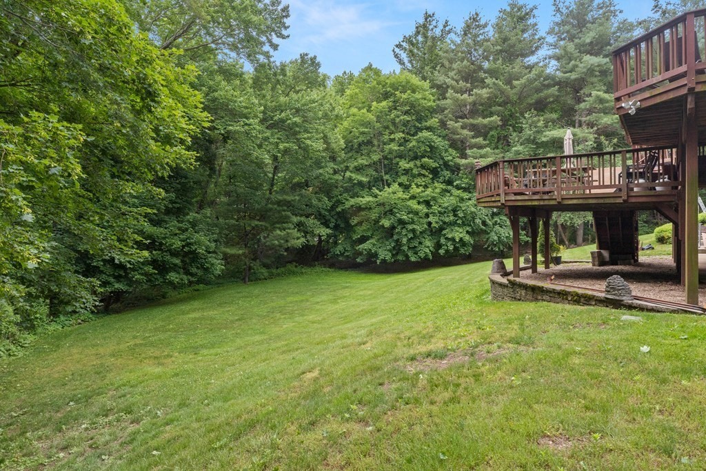 157 Spofford Road Boxford, MA 01921 - Photo 36 of 42 a view of a house with backyard porch and sitting area