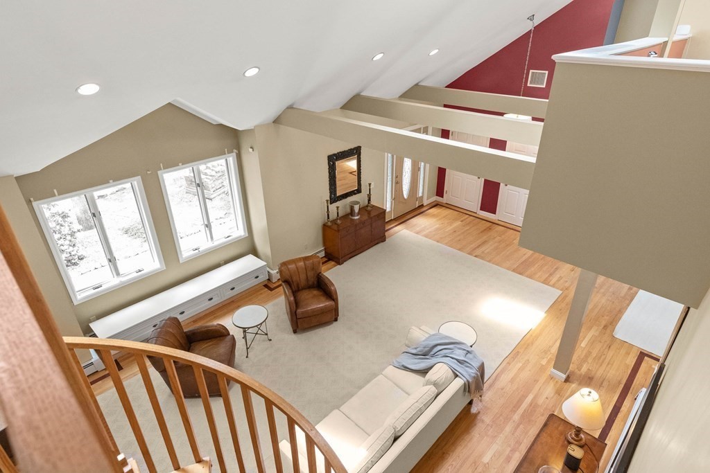157 Spofford Road Boxford, MA 01921 - Photo 7 of 42 a living room with furniture and a large window