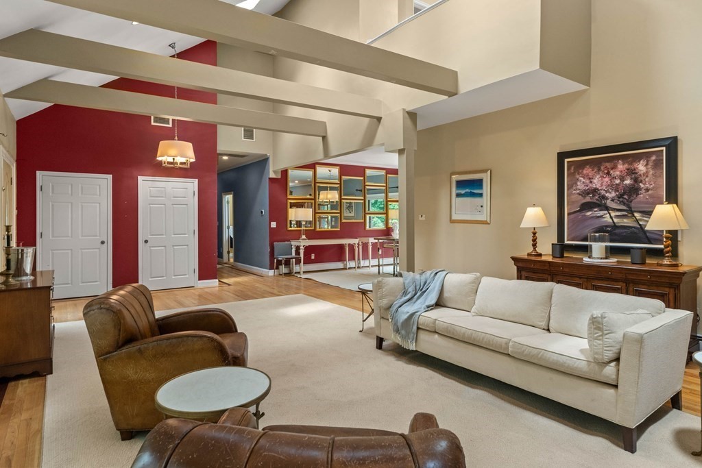 157 Spofford Road Boxford, MA 01921 - Photo 8 of 42 a living room with furniture and a large window