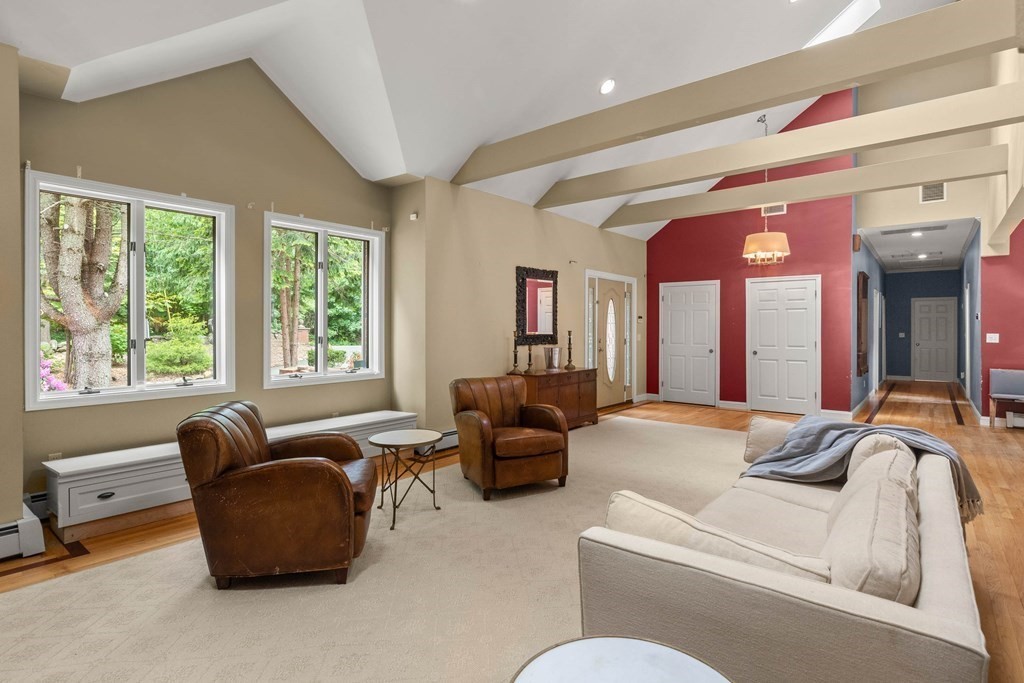 157 Spofford Road Boxford, MA 01921 - Photo 9 of 42 a living room with furniture and a large window