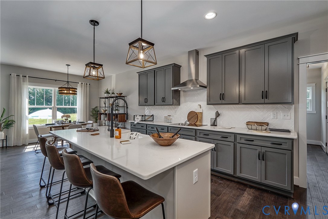 1 Scotchtown Road Beaverdam, VA 23015 - Photo 13 of 29 a kitchen with a dining table chairs and white cabinets