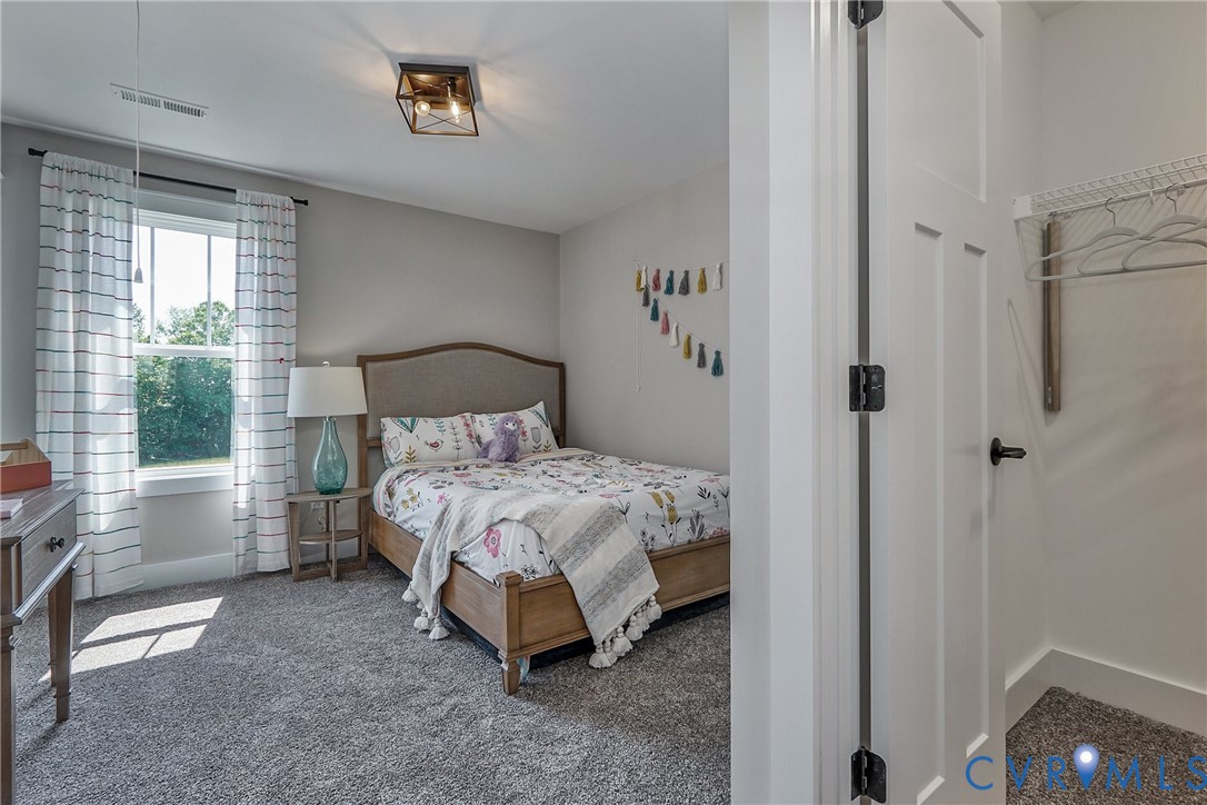 1 Scotchtown Road Beaverdam, VA 23015 - Photo 23 of 29 a bedroom with a bed and a window