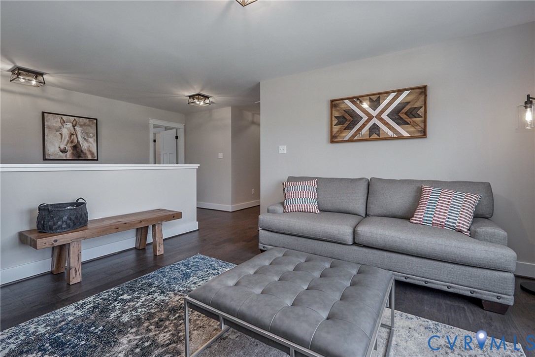 1 Scotchtown Road Beaverdam, VA 23015 - Photo 25 of 29 a living room with furniture and a rug