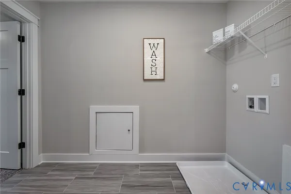 a view of room with window and hardwood floor