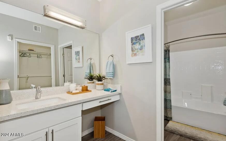 15801 South 48th Street, Unit B1 Phoenix, AZ 85048 - Photo 4 of 6 a bathroom with a sink and a mirror