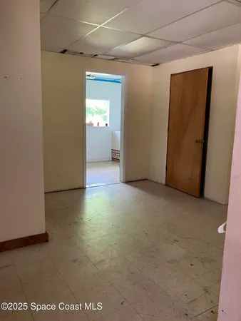 a view of a room with an empty space