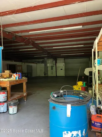 a room with furniture and a fireplace