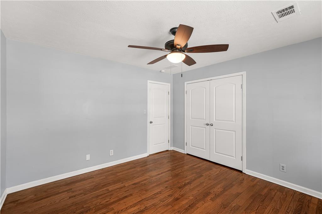 626 Grayson Parkway Grayson, GA 30017 - Photo 16 of 27 a view of an empty room and wooden floor