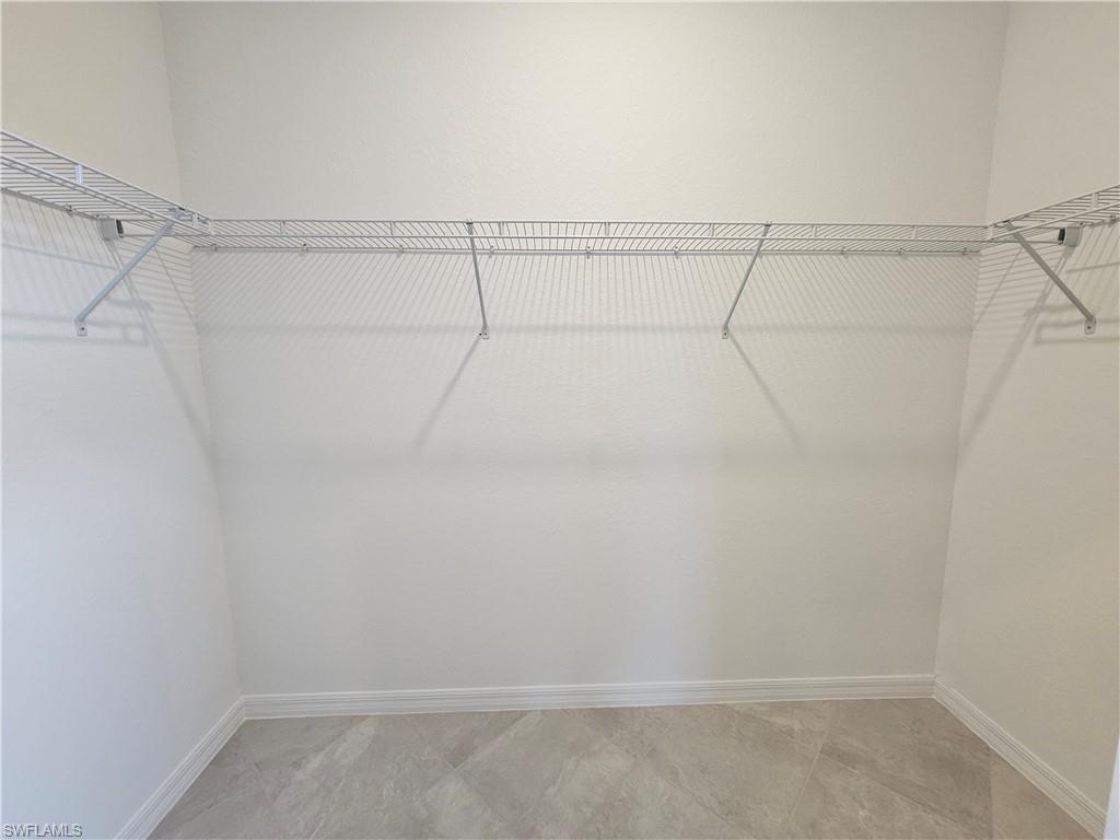 2168 Dragonfruit Way Naples, FL 34120 - Photo 16 of 27 a view of a room