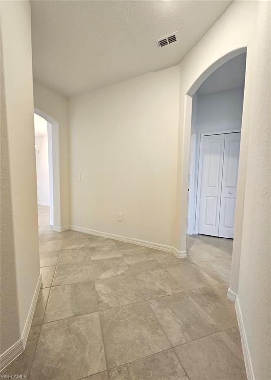 2168 Dragonfruit Way Naples, FL 34120 - Photo 3 of 27 a view of an empty room and window