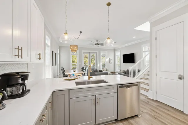 a living room with furniture fireplace and a flat screen tv