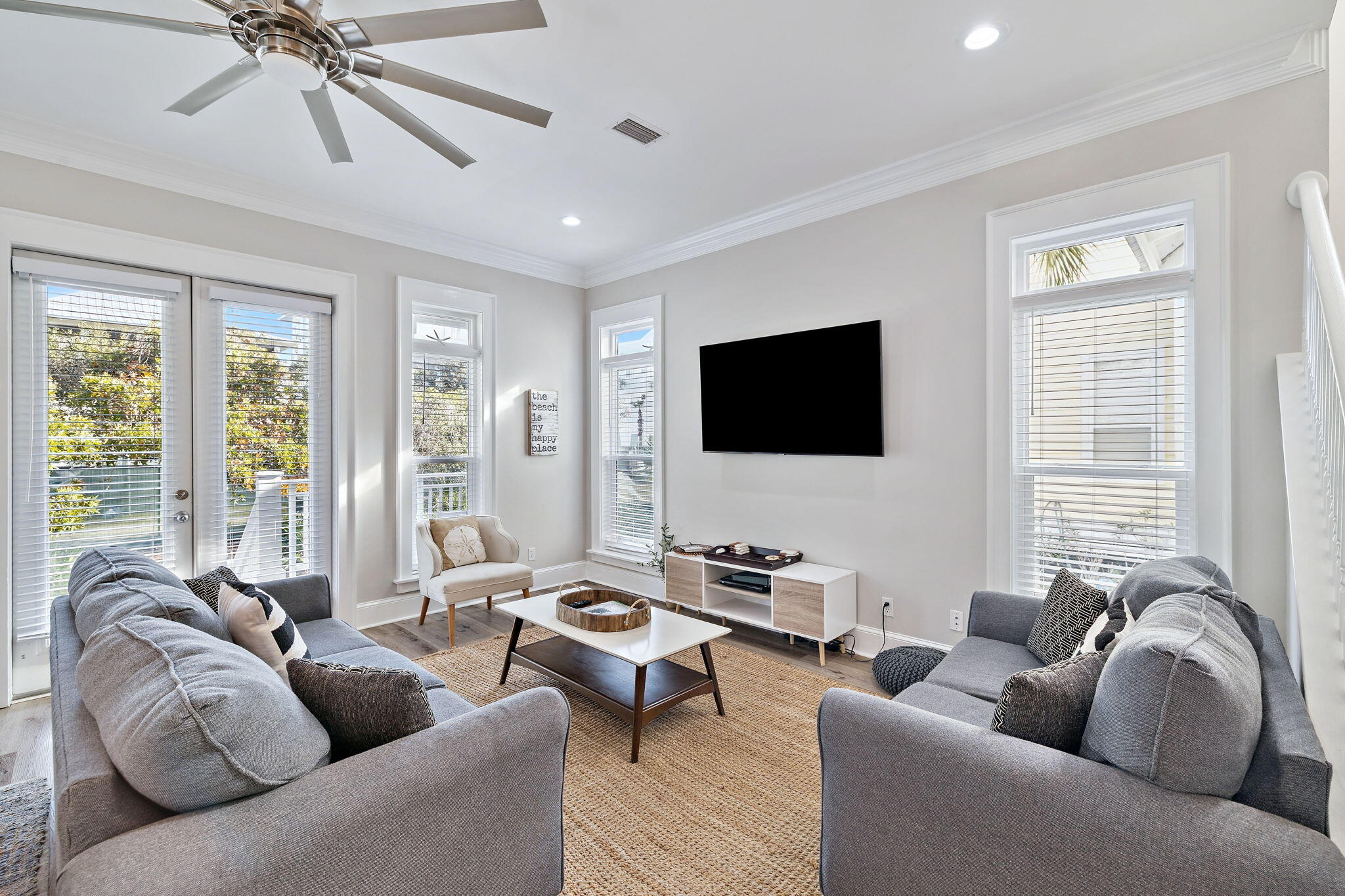 8 Barefoot Lane Seacrest, FL 32461 - Photo 16 of 62 a living room with furniture and a flat screen tv