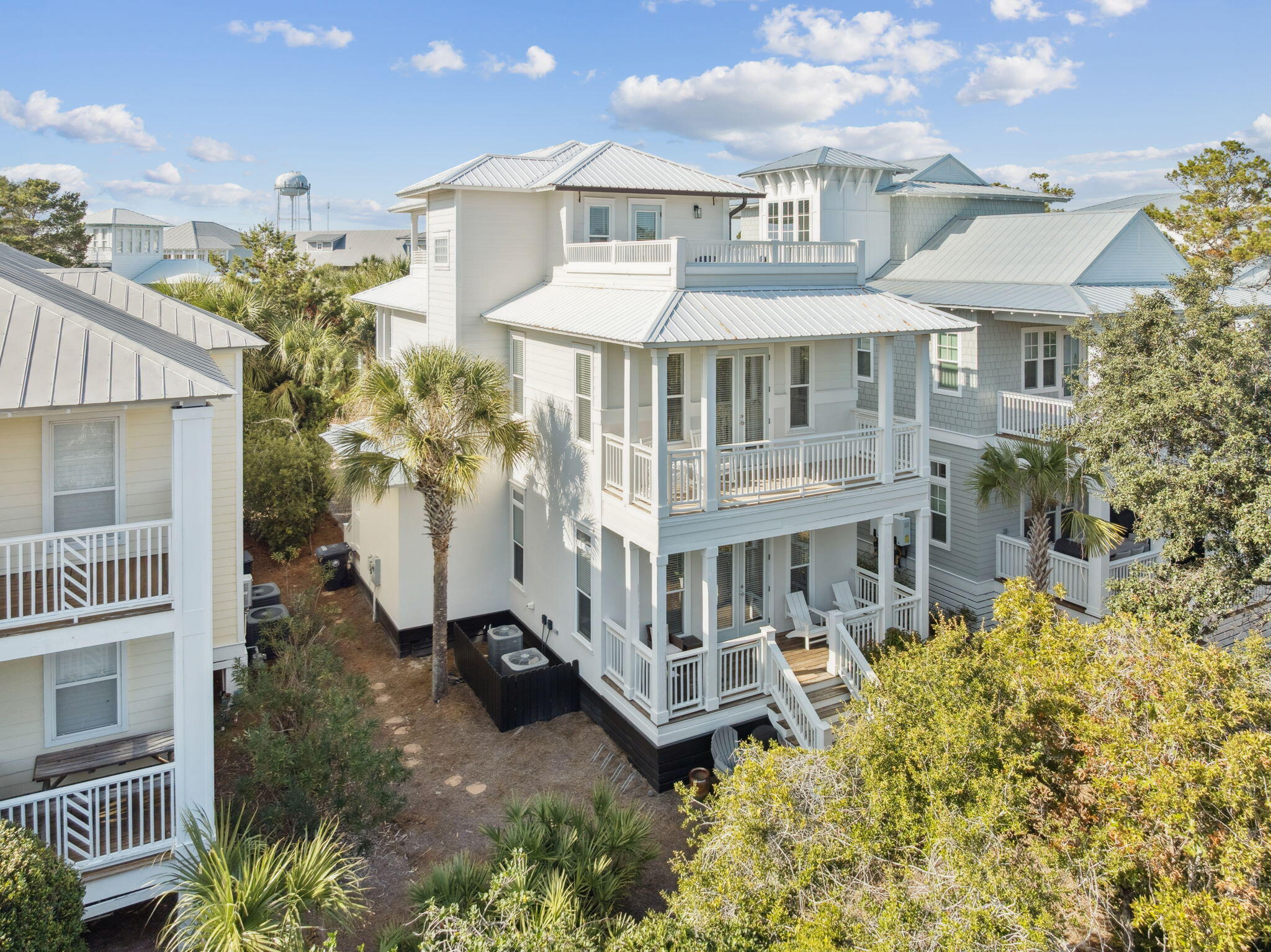 8 Barefoot Lane Seacrest, FL 32461 - Photo 18 of 62 a front view of a house with a yard