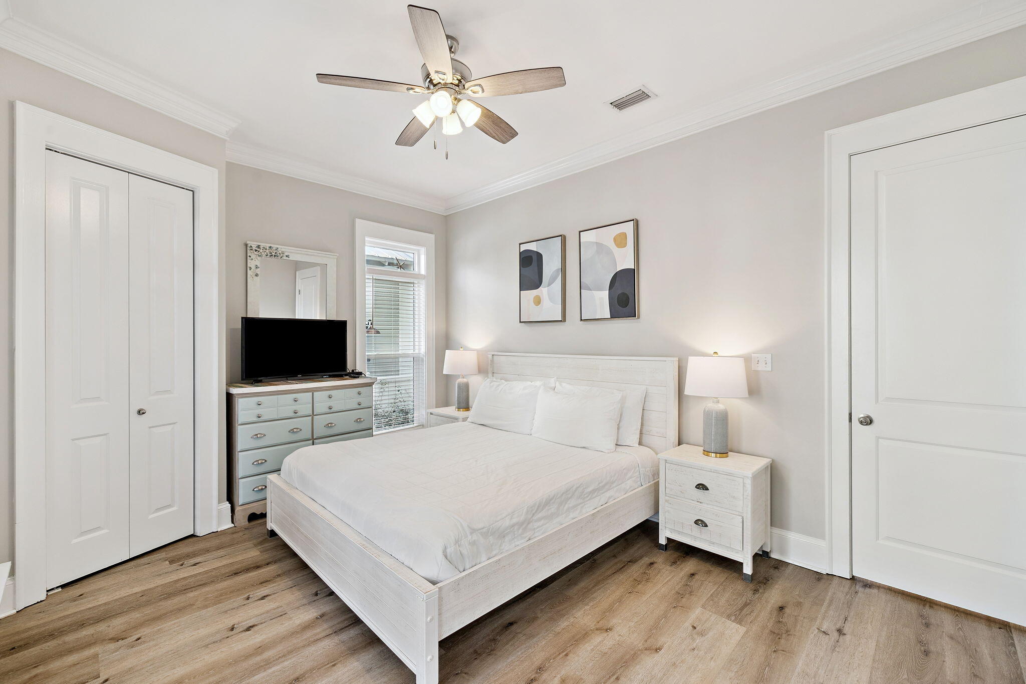 8 Barefoot Lane Seacrest, FL 32461 - Photo 19 of 62 a bedroom with a bed and a flat screen tv