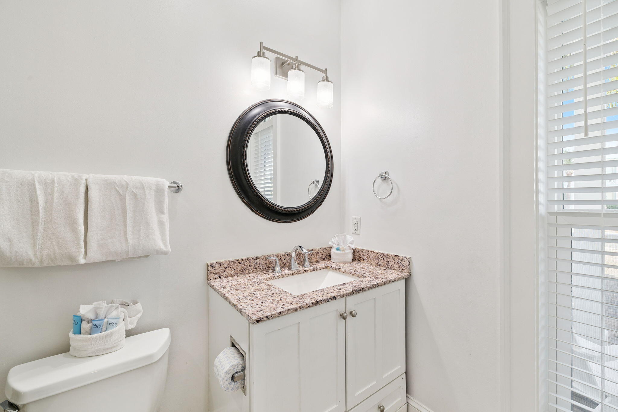8 Barefoot Lane Seacrest, FL 32461 - Photo 22 of 62 a bathroom with a granite countertop double vanity sink and a mirror