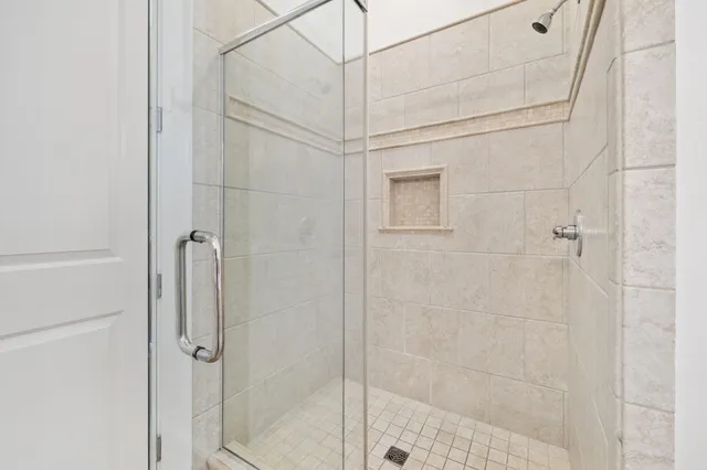 a balcony with furniture and garden view