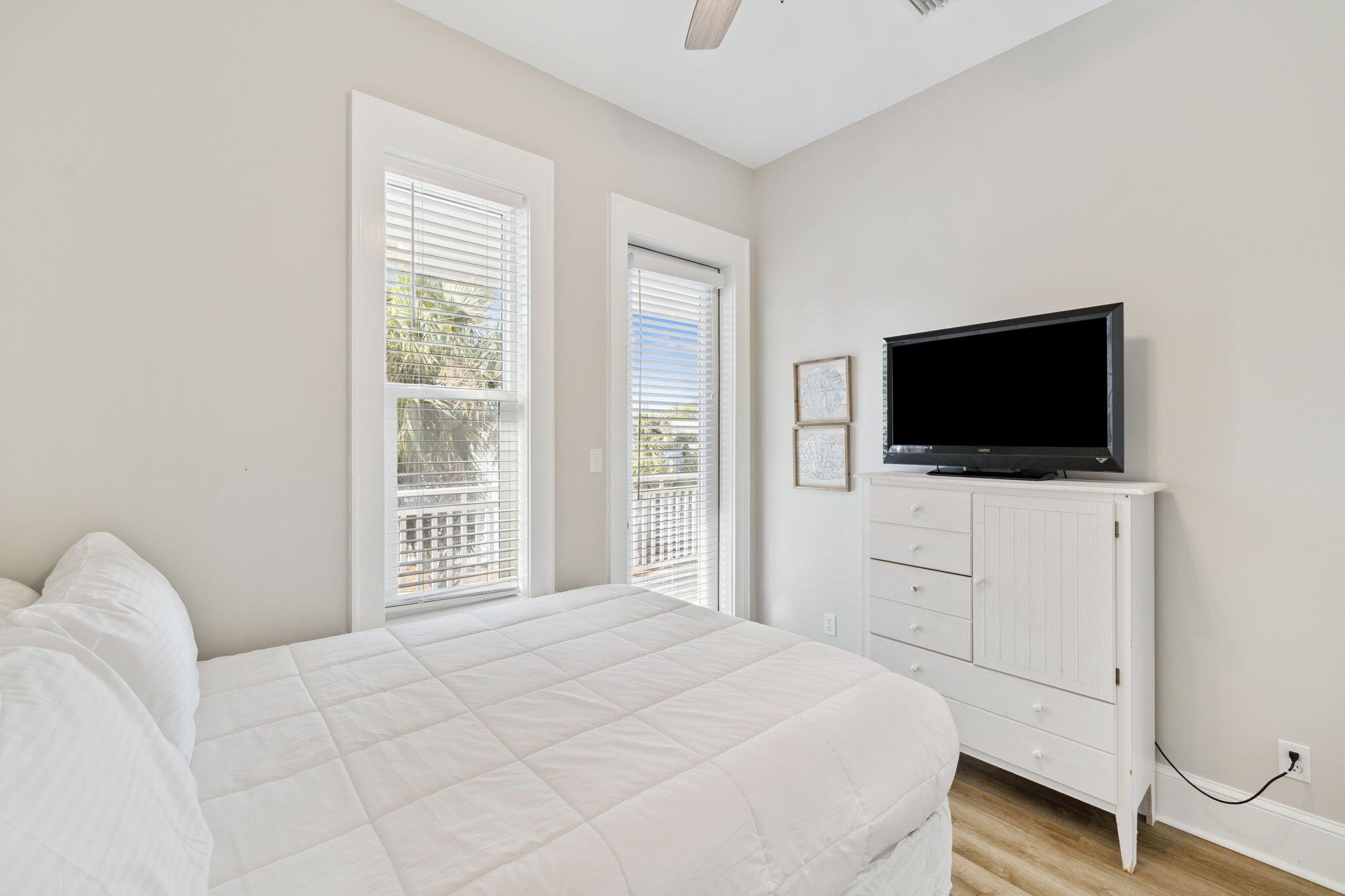 8 Barefoot Lane Seacrest, FL 32461 - Photo 35 of 62 a bedroom with a flat screen tv and a bed