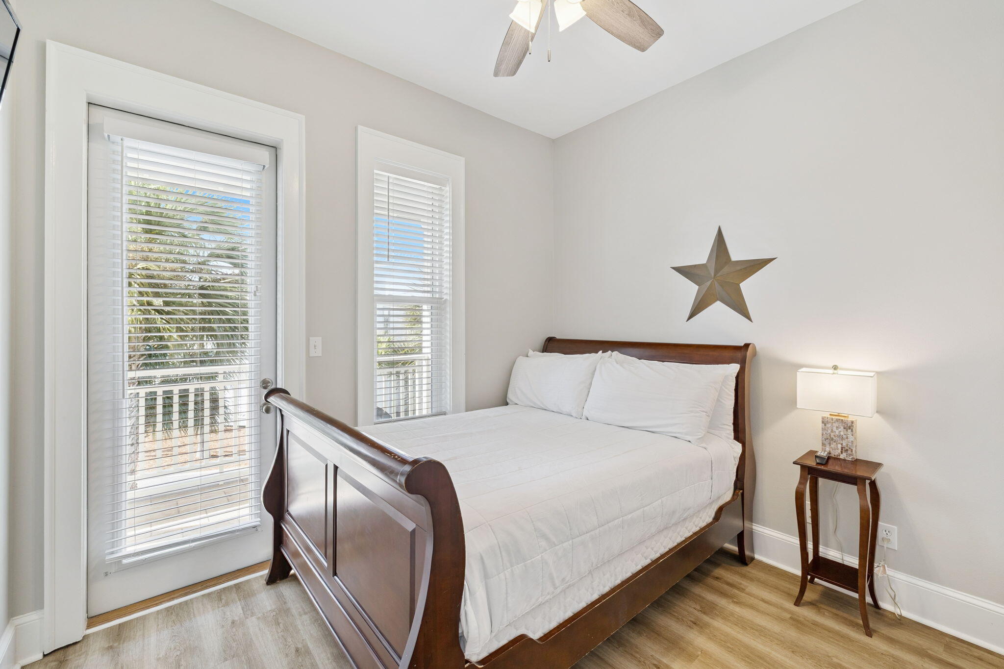 8 Barefoot Lane Seacrest, FL 32461 - Photo 36 of 62 a bedroom with a bed and a window