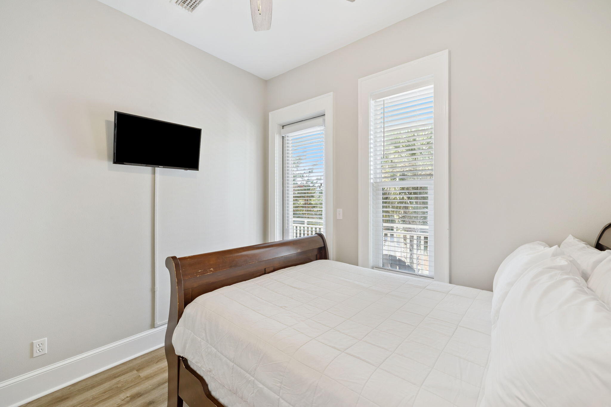 8 Barefoot Lane Seacrest, FL 32461 - Photo 37 of 62 a bedroom with a bed tv and a window