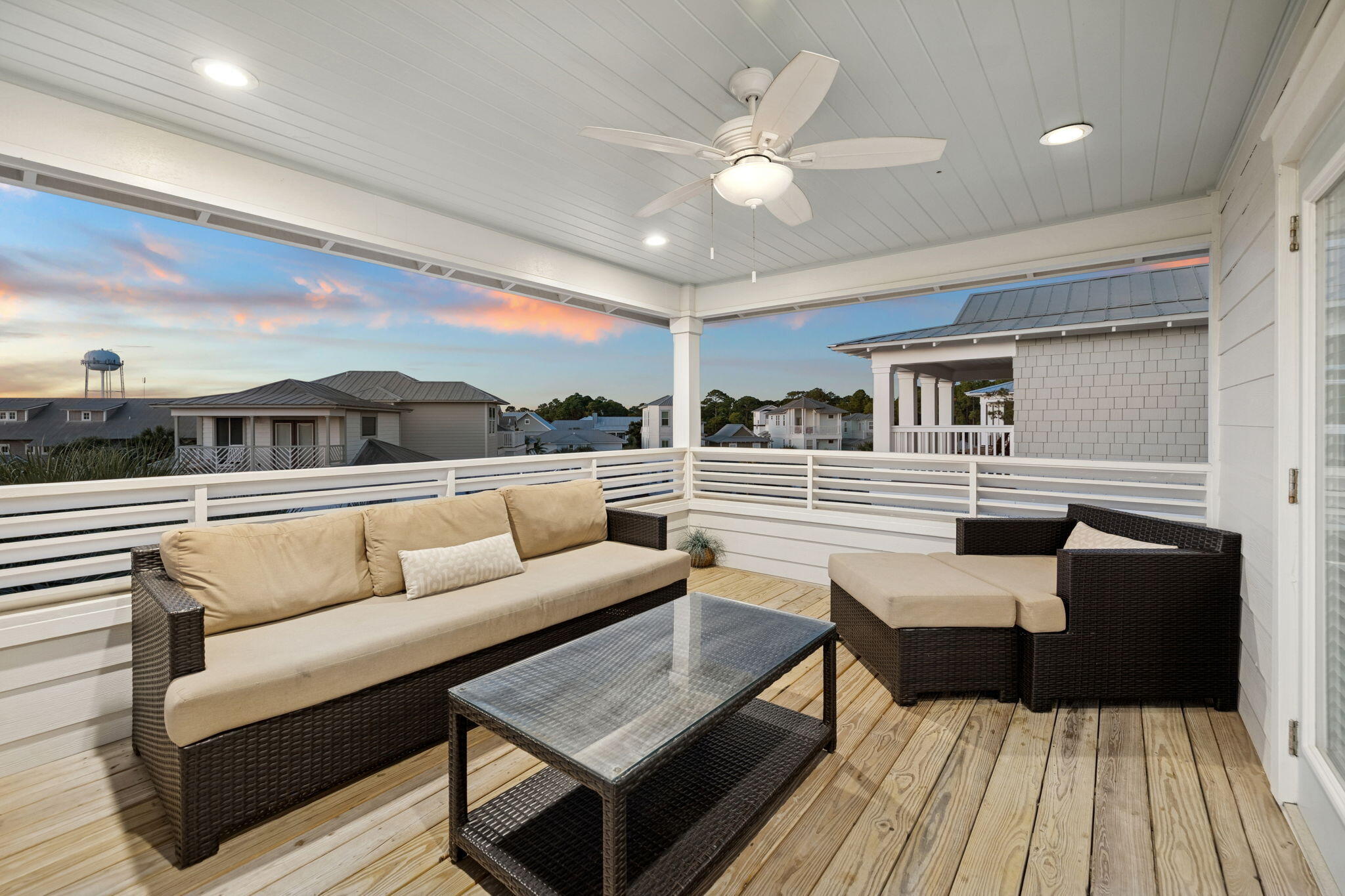 8 Barefoot Lane Seacrest, FL 32461 - Photo 45 of 62 a living room with furniture and a chandelier