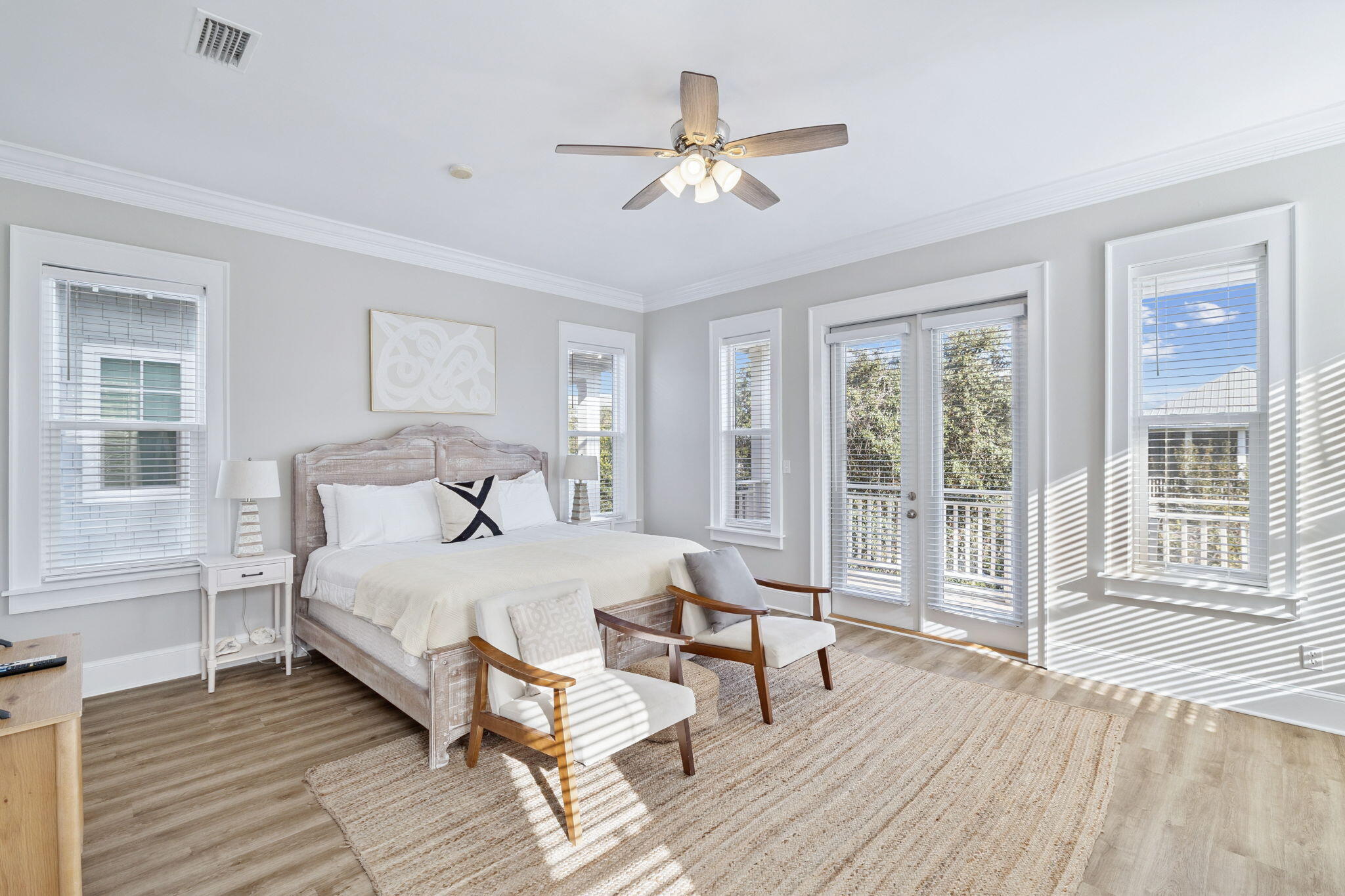 8 Barefoot Lane Seacrest, FL 32461 - Photo 5 of 62 a bedroom with a bed and wooden floor