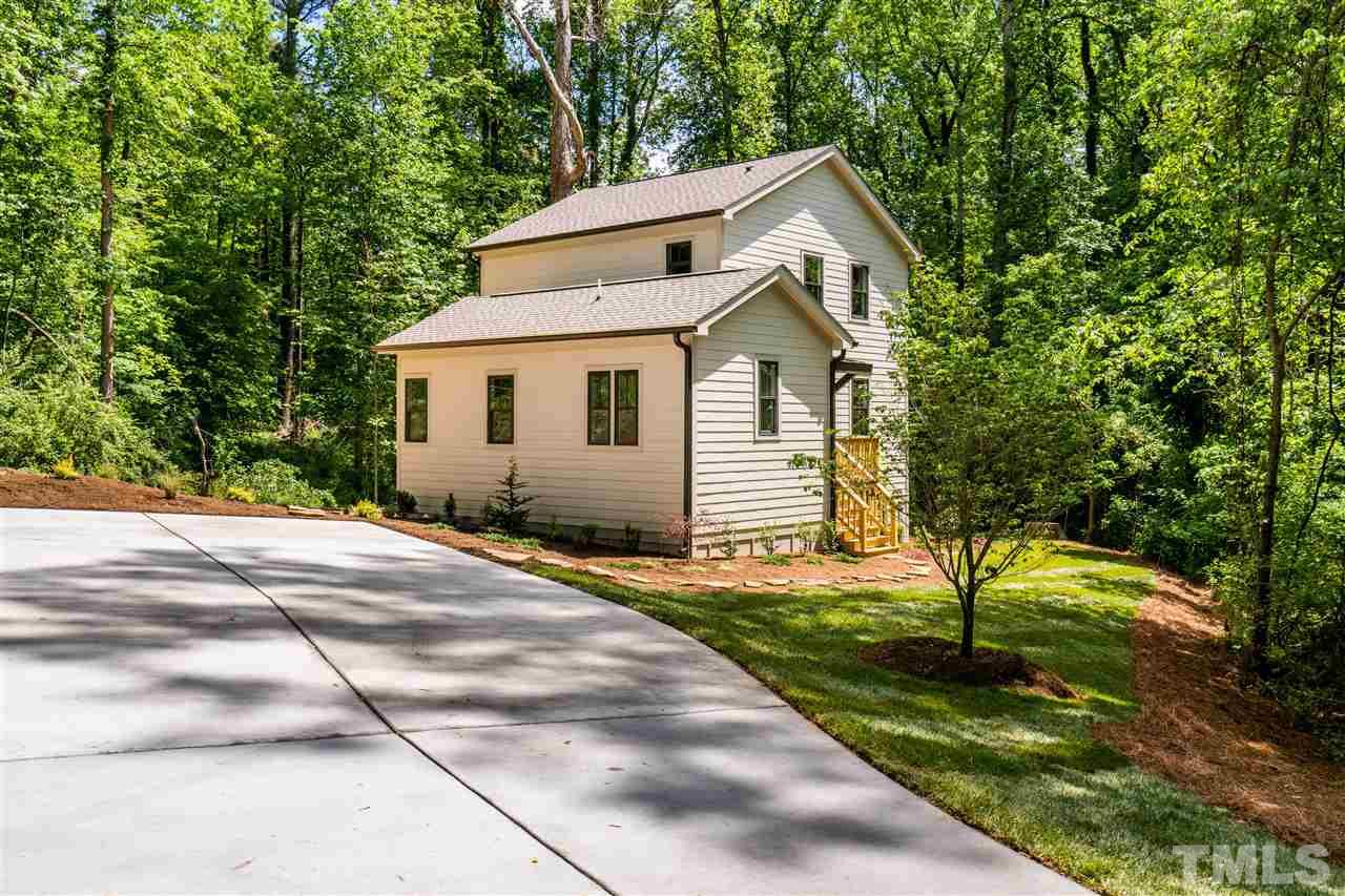 1700 Evergreen Avenue Raleigh, NC 27603 - Photo 2 of 27 a front view of a house with a yard and trees